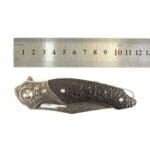 TOSAHWI Handmade Damascus Steel Folding Knife with Textured Purple Ebony Handle - Image 12